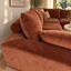 Close up of a dark rust brown modular lounge