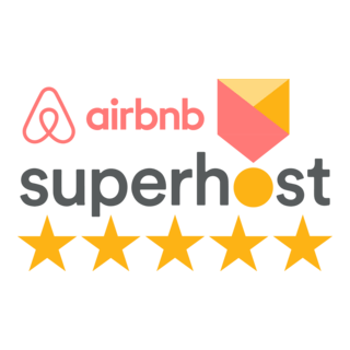 Airbnb Superhost badge with five yellow stars on a green background