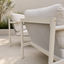 Back detail shot of an outdoor coastal patio setting