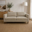 Sam 3 seater fabric sofa styled in a small living room